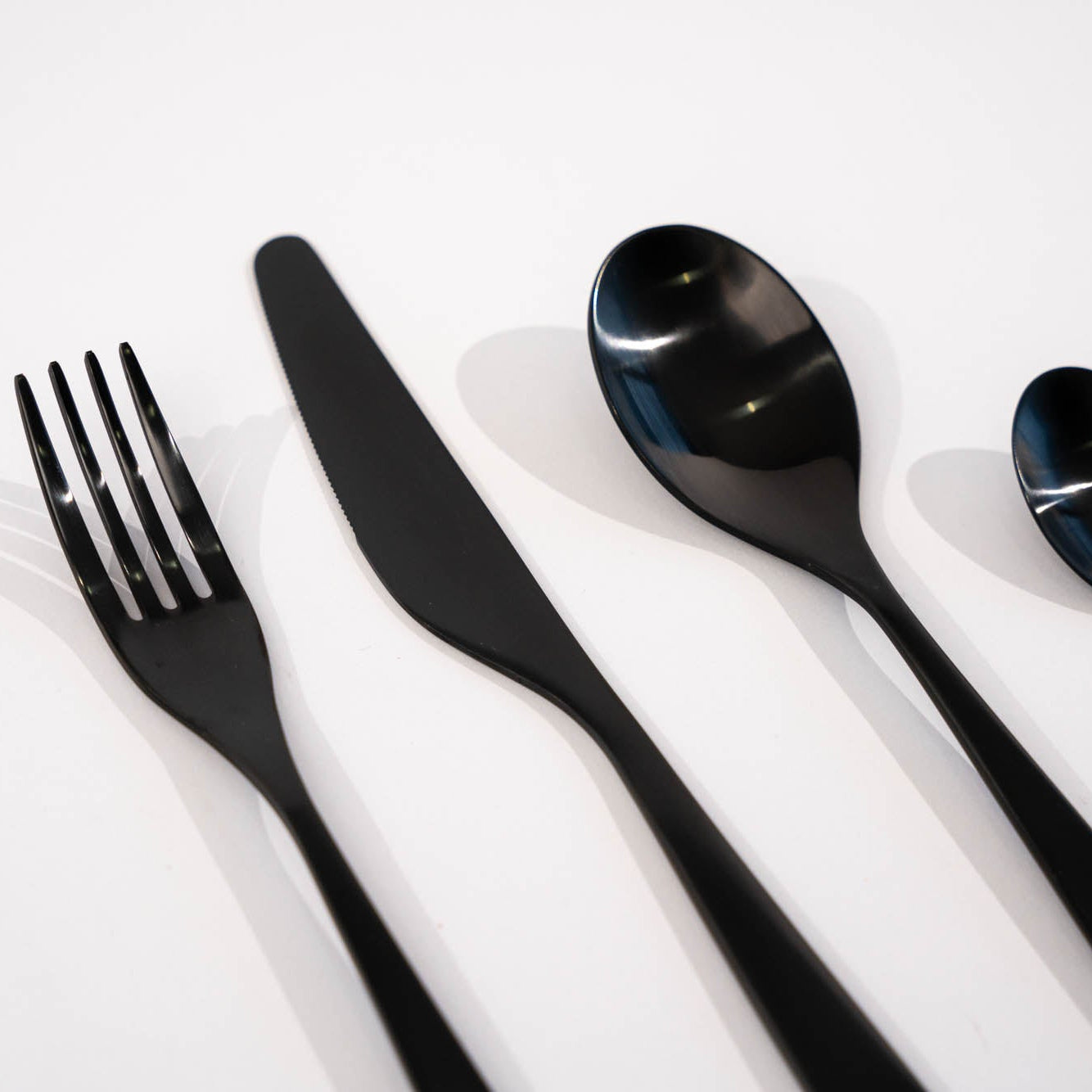 TILLAGD 24-piece cutlery set, black